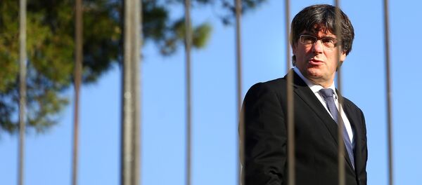 Catalan President Carles Puigdemont attends a memorial event at the tomb of former president of the Generalitat, the regional government, Lluis Companys in Barcelona, Spain, October 15, 2017. - Sputnik Afrique