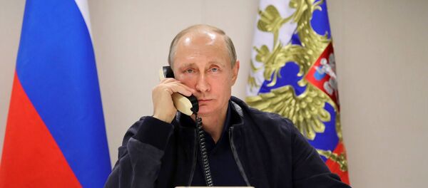 Vladimir Poutine lors d'un entretien téléphonique - Sputnik Afrique