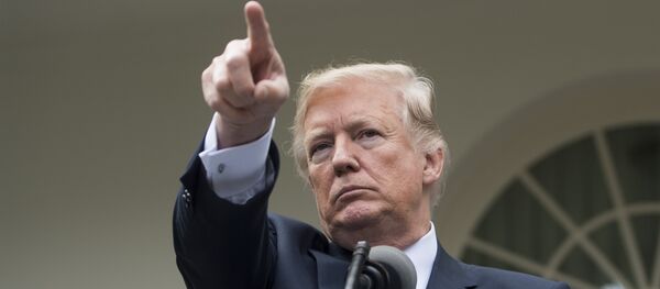This file photo taken on October 16, 2017 shows US President Donald Trump speaking to the press in the Rose Garden of the White House in Washington, DC. - Sputnik Afrique