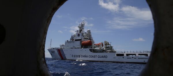 Un navire de la Garde côtière chinoise Un navire de la Garde côtière chinoise - Sputnik Afrique