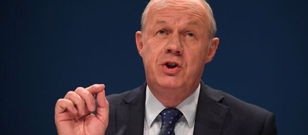 (File) Britain's Work and Pensions Secretary Damian Green delivers his keynote address at the annual Conservative Party Conference in Birmingham, Britain, October 4, 2016 - Sputnik Afrique