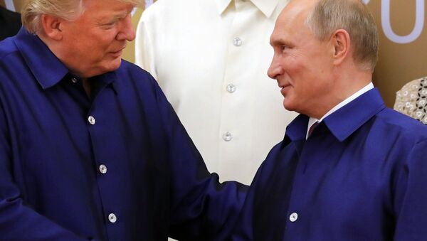 La poignée de main de MM. Poutine et Trump - Sputnik Afrique