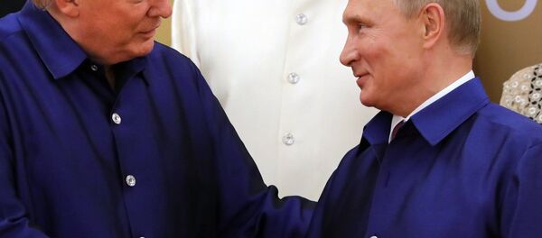 La poignée de main de MM. Poutine et Trump - Sputnik Afrique