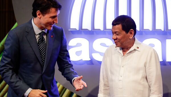 Le Premier ministre canadien Justin Trudeau et le Président philippin Rodrigo Duterte - Sputnik Afrique