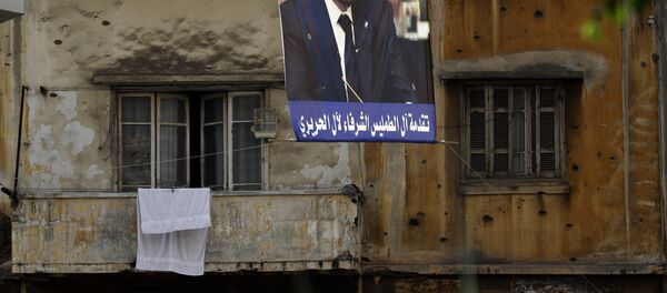 El retrato de Saad Hariri, ex primer ministro del Líbano, en la calle de Beirut - Sputnik Afrique