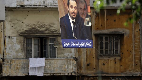 El retrato de Saad Hariri, ex primer ministro del Líbano, en la calle de Beirut - Sputnik Afrique