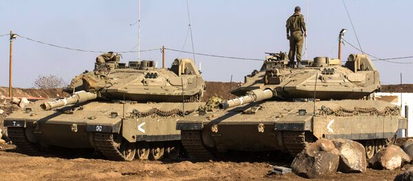 Des chars israéliens Merkava près de la frontière syrienne dans le Golan Des chars israéliens Merkava près de la frontière syrienne dans le Golan - Sputnik Afrique