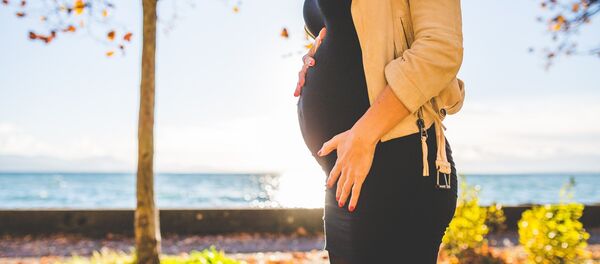 Une femme enceinte - Sputnik Afrique