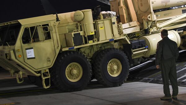 FILE - In this March 6, 2017 file photo provided by U.S. Forces Korea, a truck carrying parts of U.S. missile launchers and other equipment needed to set up the Terminal High Altitude Area Defense (THAAD) missile defense system arrive at Osan air base in Pyeongtaek, South Korea. - Sputnik Afrique