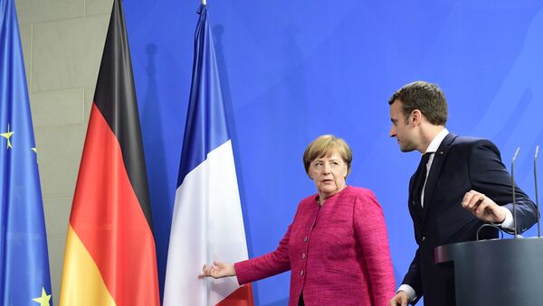 Antrittsbesuch des neuen französischen Staatspräsidenten: Emmanuel Macron bei Kanzlerin Angela Merkel - Sputnik Afrique