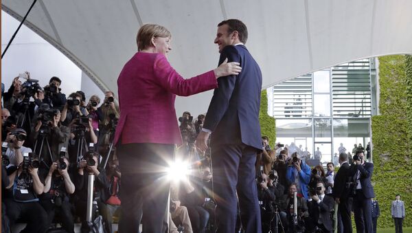 Angela Merkel, canciller de Alemania, y Emmanuel Macron, presidente de Francia - Sputnik Afrique