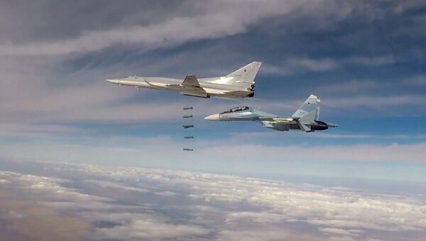 Des bombardiers lance-missiles Tu-22M3 lors d'un raid en Syrie - Sputnik Afrique