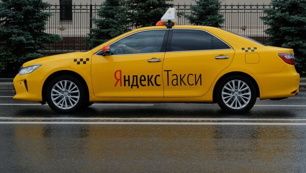 A car of the Yandex Taxi service in a street of Moscow - Sputnik Afrique