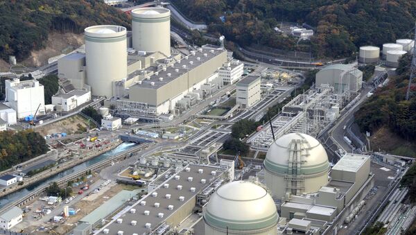 An aerial view shows No. 4 (front L), No. 3 (front R), No. 2 (rear L) and No. 1 reactor buildings at Kansai Electric Power Co.'s Takahama nuclear power plant in Takahama town, Fukui prefecture, in this file photo taken by Kyodo November 27, 2014 - Sputnik Afrique