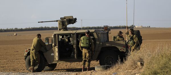 Israeli soldiers stand near the border with Gaza. (File) - Sputnik Afrique