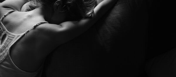 Una mujer triste (imagen referencial) - Sputnik Afrique