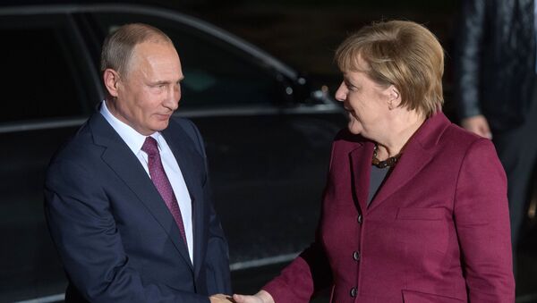 Wladimir Putin und Angela Merkel - Sputnik Afrique