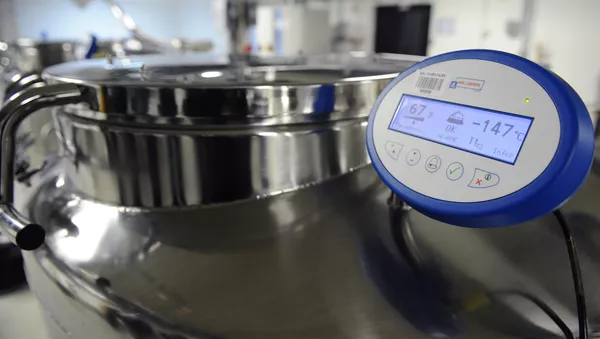 A picture shows monitor on a vat containing liquid nitrogen, used to cryogenically freeze samples, on January 23, 2015 in the Ecotheque of Bure, eastern France. - Sputnik Afrique