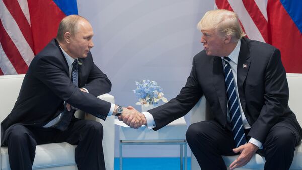 Vladimir Poutine et Donald Trump lors du sommet du G20 à Hambourg - Sputnik Afrique