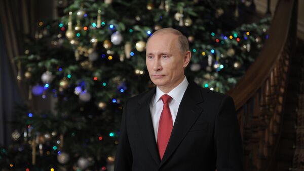 Премьер-министр РФ Владимир Путин поздравляет россиян с наступающим Новым годом - Sputnik Afrique