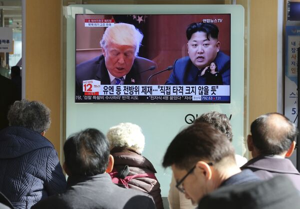 Donald Trump et Kim Jong Un Donald Trump et Kim Jong Un - Sputnik Afrique