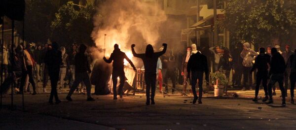 Tunisian protesters take to the streets in Siliana, some 130 kms south of Tunis, late on January 11, 2018. - Sputnik Afrique