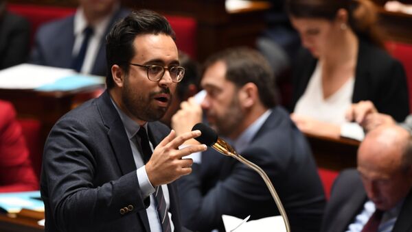 French Junior Minister for the Digital Sector Mounir Mahjoubi speaks during a session of questions to the government, on December 20, 2017 at the French National Assembly in Paris. - Sputnik Afrique
