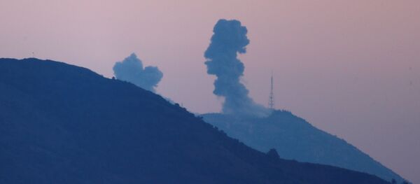 Smoke rises from the Syria's Afrin region, as it is pictured from near the Turkish town of Hassa, on the Turkish-Syrian border in Hatay province, Turkey January 20, 2018. - Sputnik Afrique