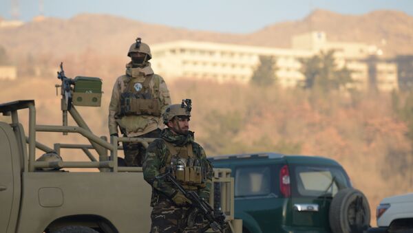Afghan security forces keep watch near the Intercontinental Hotel following an attack in Kabul on January 21, 2018. - Sputnik Afrique