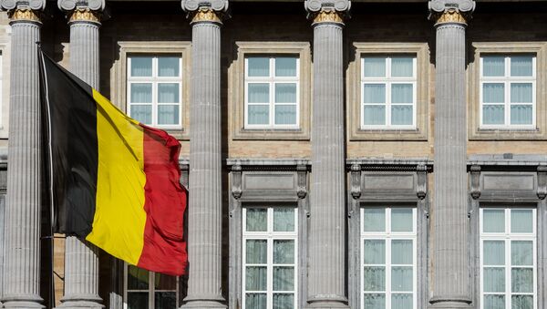 The Belgian flag flies outside the Belgian federal parliament in Brussels. (File) - Sputnik Afrique