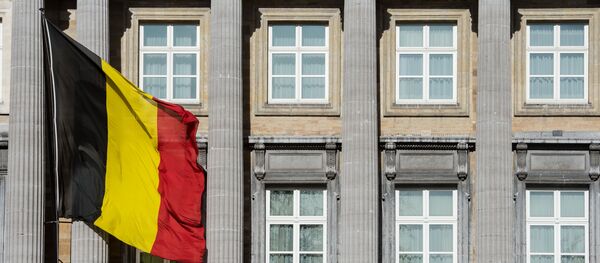 The Belgian flag flies outside the Belgian federal parliament in Brussels. (File) - Sputnik Afrique
