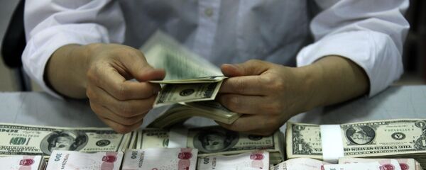 Yuans et dollars - Sputnik Afrique