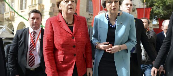 Angela Merkel et Theresa May - Sputnik Afrique