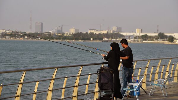 Couple saoudien péchant sur la plage de Djeddah - Sputnik Afrique