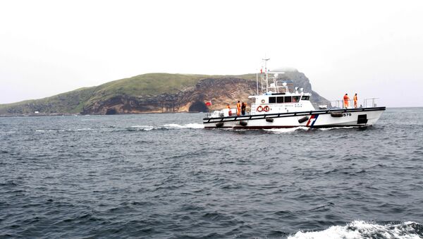 Taiwan Coast Guard's vessel patrols during Taiwanese President Ma Ying-jeou's visit to Pengjia Islet in the East China Sea, north of Taiwan, Saturday, April 9, 2016. - Sputnik Afrique
