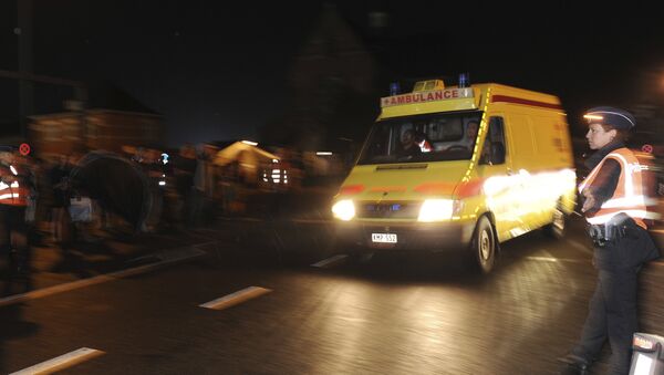 An ambulance leaves the scene after a storm swept through an open air music festival near Hasselt, about 50 miles (80 kilometers) east of Brussels, Belgium, Thursday, Aug. 18, 2011. - Sputnik Afrique