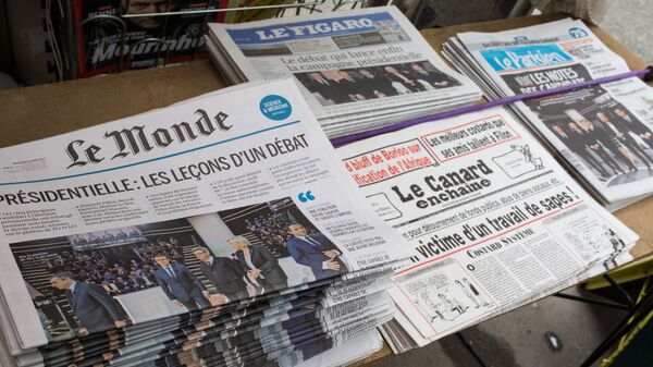 Первые полосы газет, посвященных президентским дебатам во Франции - Sputnik Afrique