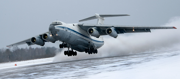 Выполнение посадки на грунтовый аэродром самолетами Ан-22 «Антей», Ил-76МД и Ан-26 ВТА России в сложных метеоусловиях (Тверская обл.) - Sputnik Afrique