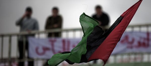 Bandera de Libia en la ciudad de Derna (archivo) - Sputnik Afrique