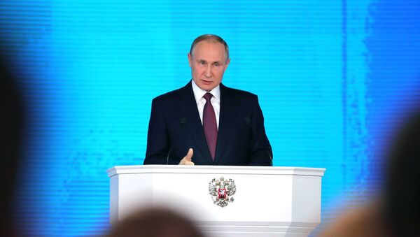 Russian President Vladimir Putin delivers his annual Presidential Address to the Federal Assembly at the Manezh Central Exhibition Hall - Sputnik Afrique