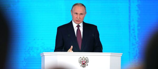Russian President Vladimir Putin delivers his annual Presidential Address to the Federal Assembly at the Manezh Central Exhibition Hall - Sputnik Afrique
