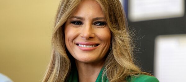 U.S. first lady Melania Trump smiles during a visit to Excel Academy Public Charter School in Washington U.S. first lady Melania Trump smiles during a visit to Excel Academy Public Charter School in Washington - Sputnik Afrique