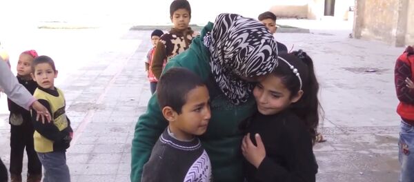 Une fillette syrienne raconte sa fuite sous les tirs des radicaux de la Ghouta orientale - Sputnik Afrique