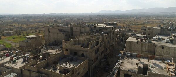 Couloir humanitaire dans la Ghouta orientale Couloir humanitaire dans la Ghouta orientale - Sputnik Afrique