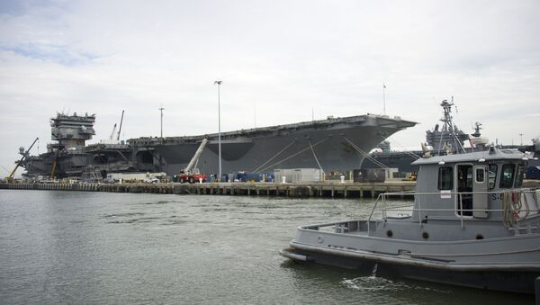 The Navy aircraft carrier USS Enterprise rests at the pier as it is gutted before being official decommissioned at Naval Station Norfolk in Norfolk, Virginia, May 8, 2013, during the Department of Defense's tour deemed Navy 101 - Sputnik Afrique