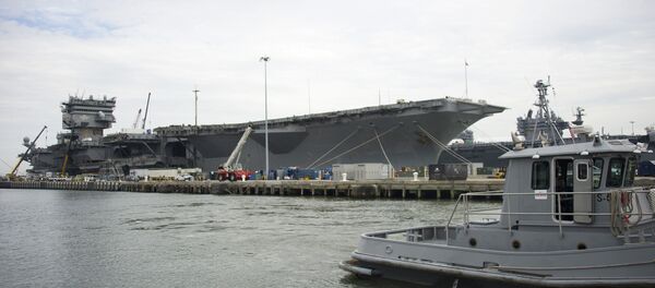 The Navy aircraft carrier USS Enterprise rests at the pier as it is gutted before being official decommissioned at Naval Station Norfolk in Norfolk, Virginia, May 8, 2013, during the Department of Defense's tour deemed Navy 101 - Sputnik Afrique