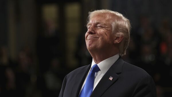 President Donald Trump smiles during State of the Union address in the House chamber of the U.S. Capitol to a joint session of Congress Tuesday, Jan. 30, 2018 in Washington - Sputnik Afrique