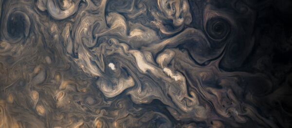 Jupiter's stormy atmosphere, photographed by Juno's JunoCam during the probe's eighth flyby. - Sputnik Afrique