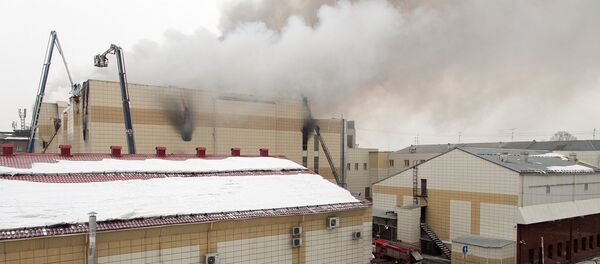 Пожар в торговом центре «Зимняя вишня» в Кемерово - Sputnik Afrique