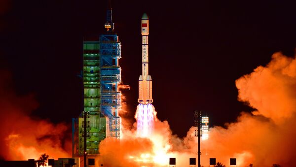 China's Tiangong 2 space lab is launched on a Long March-2F rocket from the Jiuquan Satellite Launch Center in the Gobi Desert, in China's Gansu province - Sputnik Afrique